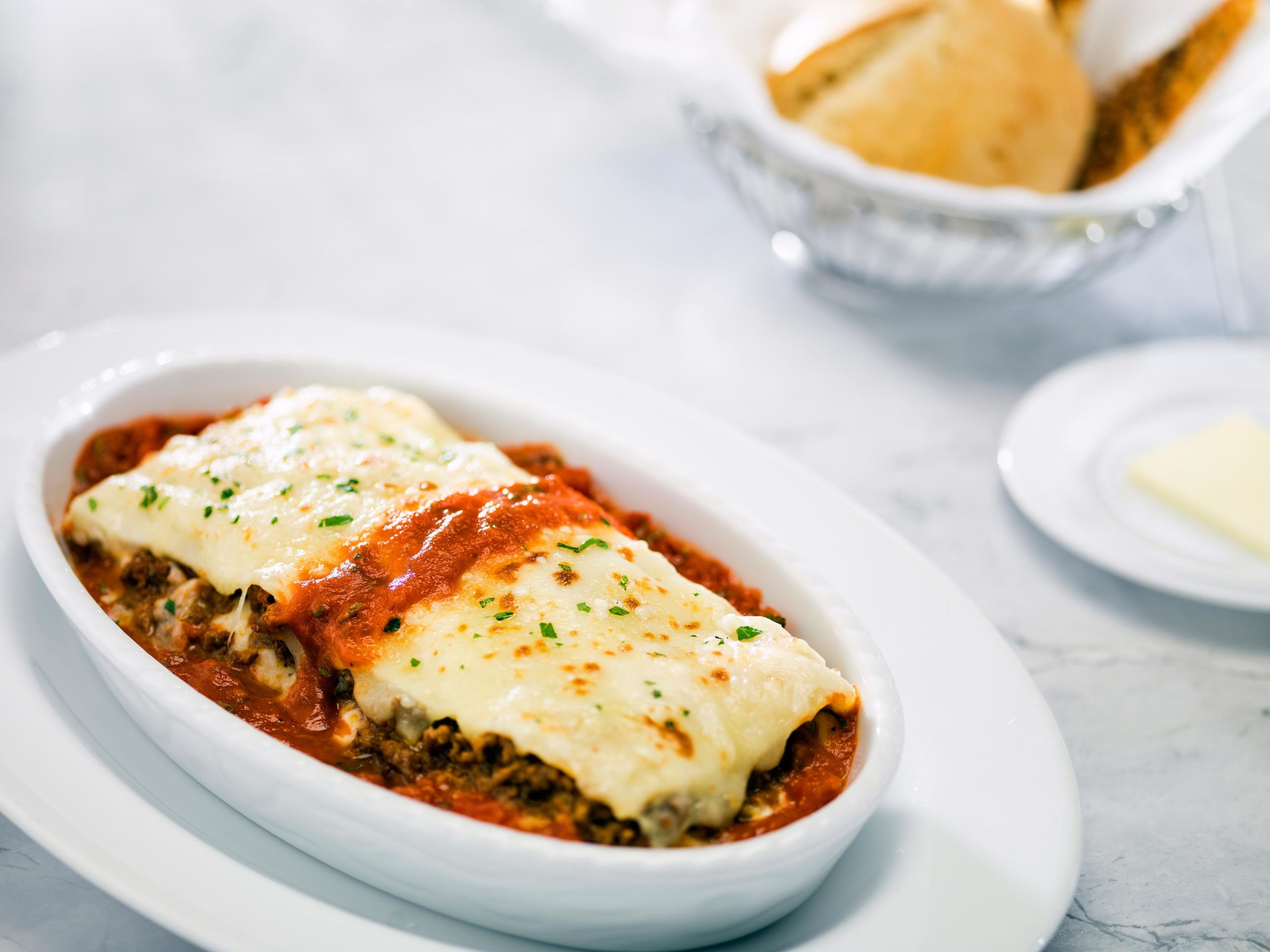 lasagna in a white dish brio tuscan grille